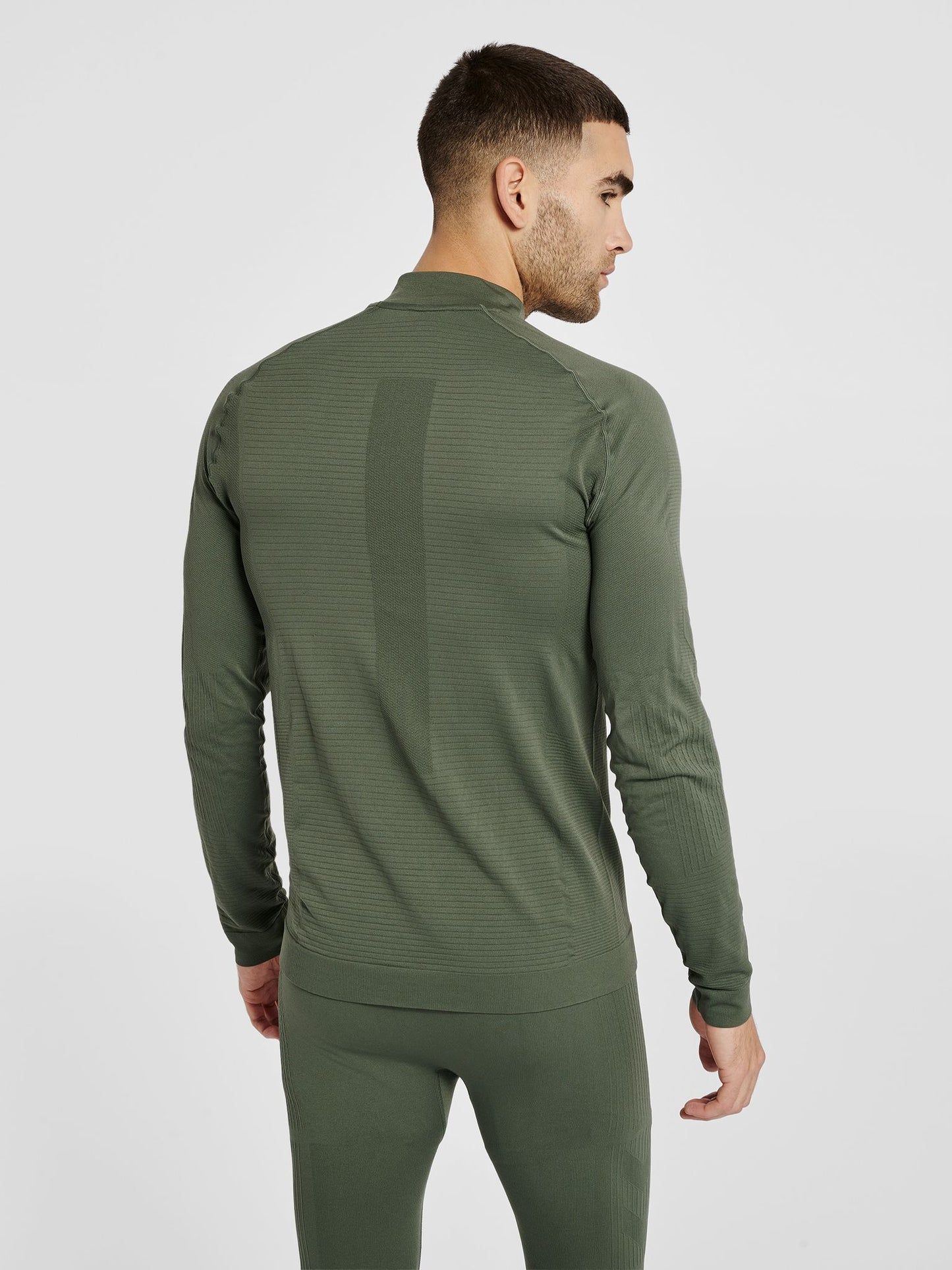 hmlSTROKE SEAMLESS HALF ZIP