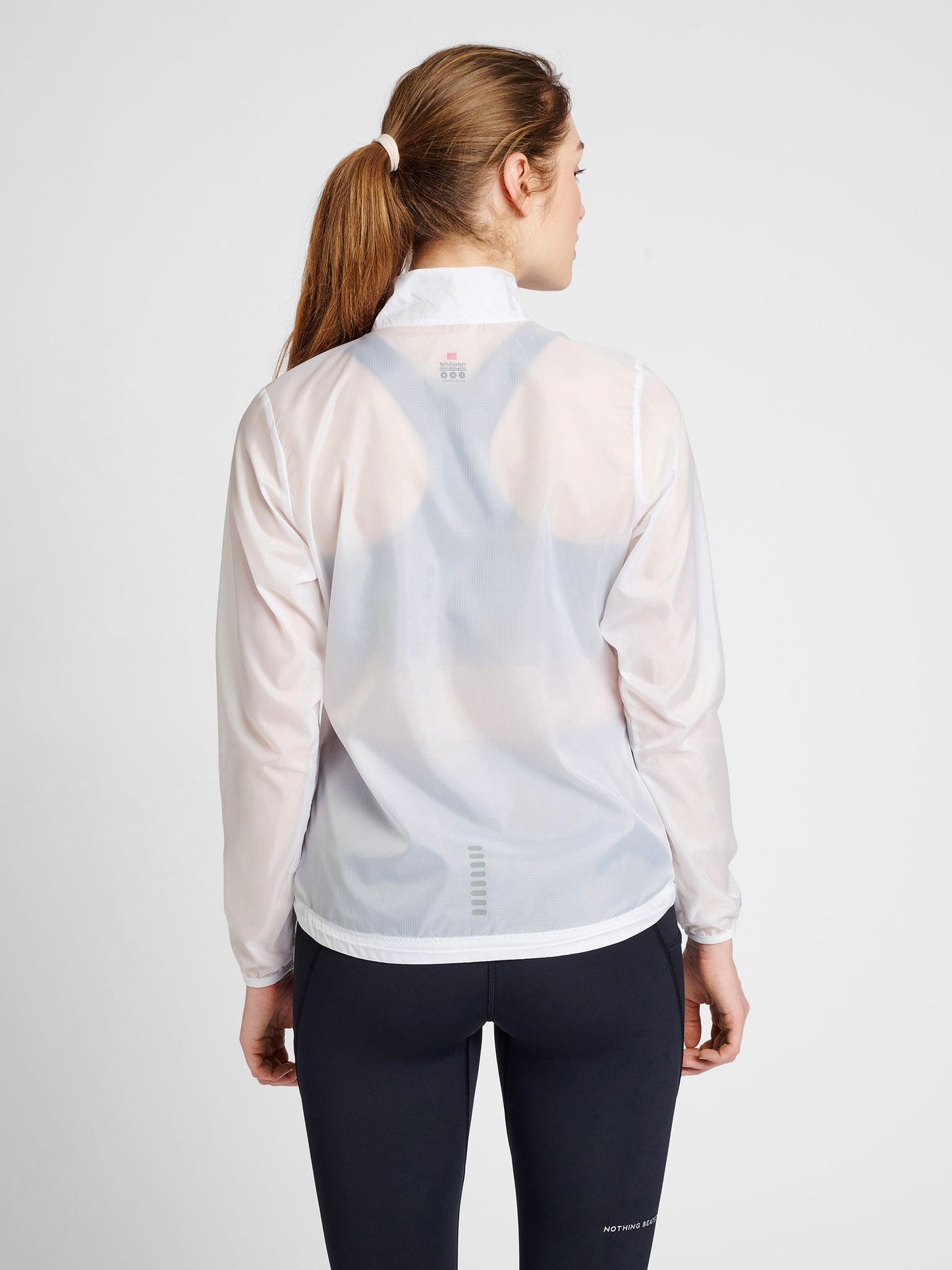 WOMEN PACKABLE TECH JACKET